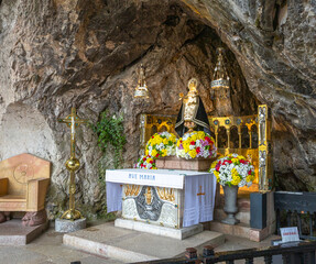 View of the Holy Cave (Santa Cueva) in Covadonga. In it is the Virgin of Covadonga or the Santina,...