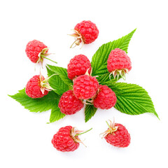 Flying pink berries with green leaves on a white background. Ripe summer raspberries.