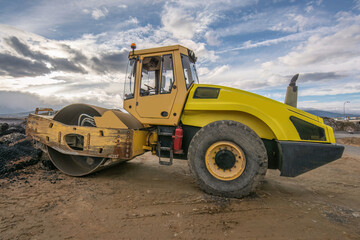 Obraz na płótnie Canvas Steamroller at a road construction site