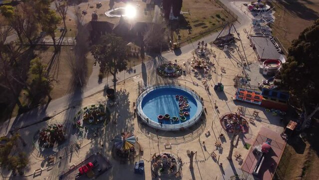 Aerial drone descending top down over abandoned Children Republic or Republica de los Niños amusement park at La Plata in Buenos Aires, Argentina