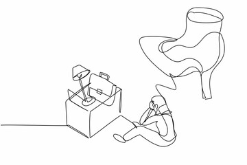 Single one line drawing young businesswoman sitting on floor near office supplies under big foot stomp. Unemployment, jobless, job reduction metaphor. Continuous line draw design vector illustration