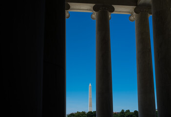Washington Monument With Architectural Columns in the Foreground