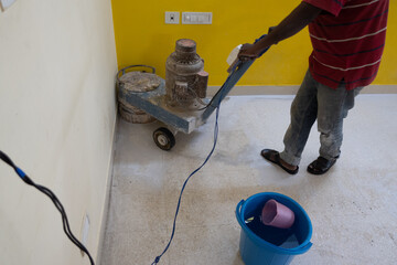 Bangalore, India 12th July 2022: Mosaic Tiles Polishing and Cleaning to remove dust and texture...