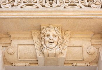  Mascaron on building facad