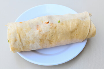 Lavash doner kebab ( doner zurna durum )  or shawarma sliced in plate isolated. 