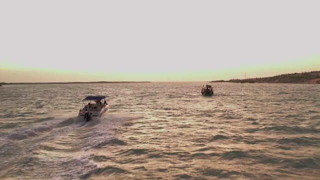Aerial Follow power boat speeding in the River in Campinos - Brazil