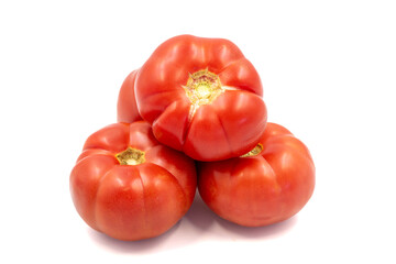 Ripe Tomatoes. Fresh and raw red tomatoes isolated on white background. Organic food. close up