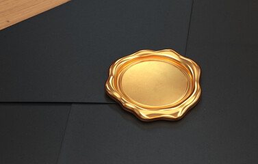 Gold wax seal on a black envelope close-up, 3d render - obrazy, fototapety, plakaty