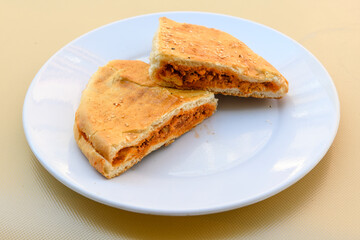 Turkish toast, mixed toast with cheddar cheese, sausage and ham, with fried potatoes (Turkish name; Bazlama Karisik tost)