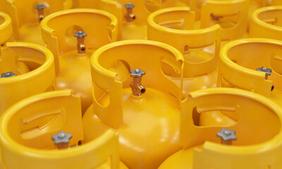 Yellow gas cylinders close-up, 3d render