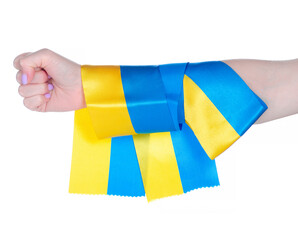 Ukraine flag ribbon female hand fist strength unity on white background isolation