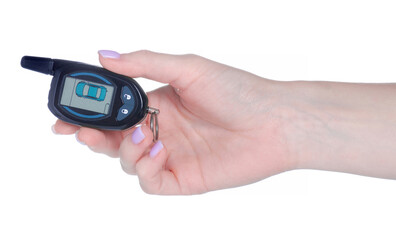 Key fob car alarm in hand on white background isolation