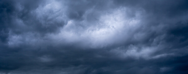 Storm clouds with the rain, nature Background.Beautiful storm sky with clouds and field,...
