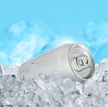 Aluminum Tin Can with ice cubes on blue background. Blank metallic can drink beer soda water juice packaging