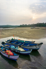 Local fishing boats on Talpona beach, south Goa, India.