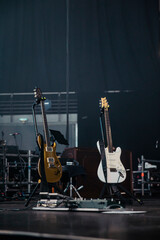 General view of two guitars on stage waiting for his players