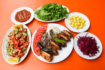 Chicken wings barbeque in a dish with BBQ grill sauce . Izgara tavuk kelebek sis kanat. Tavuk sis,...