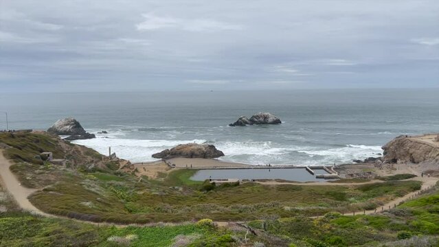 Panoramic shot of the coast of San Francisco with the Sutro Baths in the middle