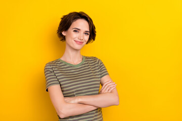 Closeup photo of young attractive girl wear fist up celebrate victory tournament isolated on yellow color background