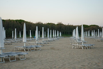 Sunbeds on beach in Jesolo Italy