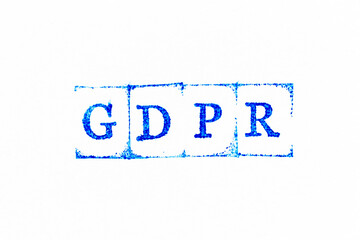 Blue color ink rubber stamp in word GDPR (General Data Protection Regulation) on white paper...