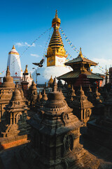 Fototapeta premium The largest stupa at Swayambhunath Temple with smaller stupa and pagoda.