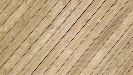 Top aerial view of water and wooden pier in a summer time. Stock footage. Camera moving away from the wooden pier made of narrow boards above the river.