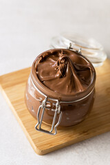 Background with Tasty Homemade Chocolate Spread or Butter Above Vertical
