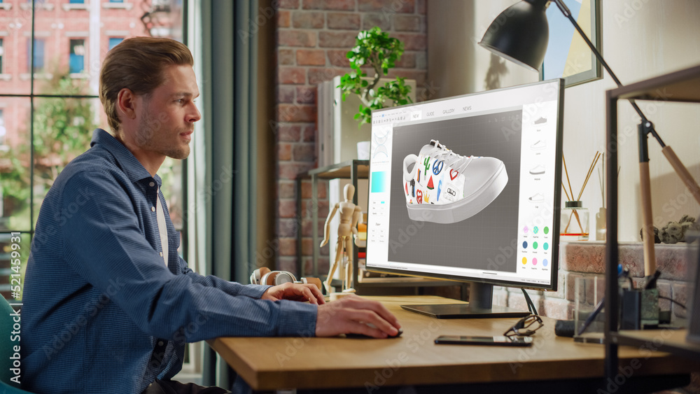 Leinwandbilder Young Male Footwear Designer Works on 3d Model of Shoe and Change Colours on It While Working on Desktop Computer in Creative Space. Shoe Production Procedure Concept.