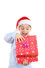 Little Boy in Santa Hat is Surprised with His Gift