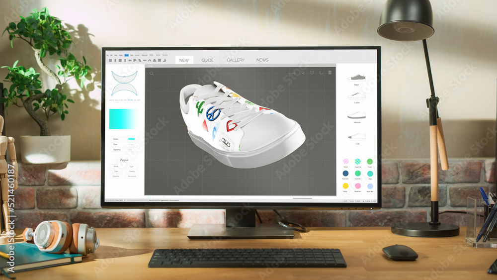 Poster Desktop Computer Monitor Standing on a Table with 3D Design Softwear Processing a Model of Shoe. Cozy Empty Loft Apartment with Big Window with a Lamp, Notebook and Headphones on the Table.