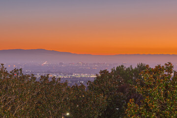 Orange Sunset Above San Jose Landscape Behind Flickering Trees