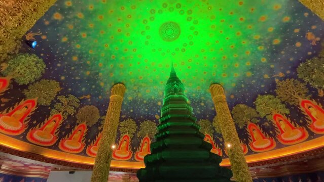 Beautiful art on ceiling inside Wat Paknam Phasi Charoen, famous buddhist temple with giant golden buddha statue, Bangkok, Thailand