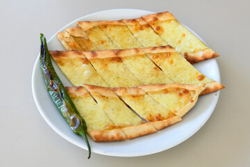 Turkish pita with minced cubed meat and cheese (Turkish name: Kiyma Kusbasi kasarli pide)