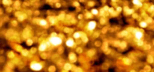 Golden nugget wide background with bokeh effect