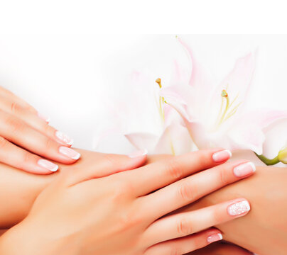 manicure pedicure with flower lily close up isolated on white perfect shape hands spa salon