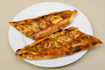 Turkish pita with minced cubed meat and cheese (Turkish name: Kiyma Kusbasi kasarli pide)