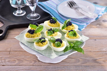 Stuffed eggs with pesto