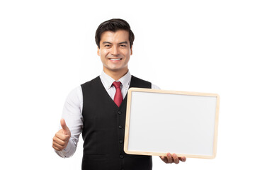 Portrait of happy smiling young businessman showing blank signboard with copyspace for text isolated on white background.