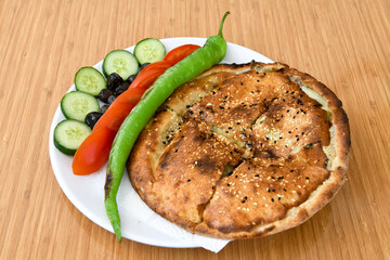 Turkish pita with minced cubed meat and cheese (Turkish name: Kiyma Kusbasi kasarli pide)