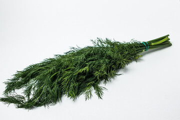 Bunch of dill isolated on white background. Healthy and delicious herbs