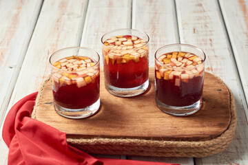 Refreshing cocktail called clericot or sangria, with citrus and red wine.