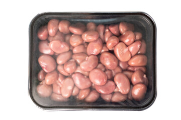 Raw rabbit kidney meat in a plastic container. Isolated.