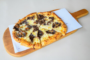 Turkish pita with minced cubed meat and cheese (Turkish name: Kiyma Kusbasi kasarli pide)