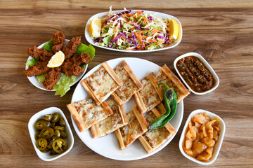 Turkish pita with minced cubed meat and cheese (Turkish name: Kiyma Kusbasi kasarli pide)