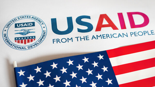 USAid logo letterhead and US flag in foreground