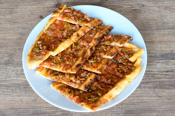 Turkish pita with minced cubed meat and cheese (Turkish name: Kiyma Kusbasi kasarli pide)
