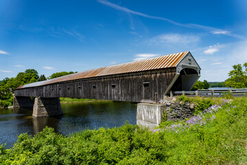 Fototapeta na wymiar Cornish-Windsor Covered Bridge. Built in 1866, longest two-span covered bridge. Site of General Lafayette's crossing. Crosses Connecticut River between Cornish, New Hampshire, and Windsor, Vermont.