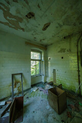 Abandoned room with broken furniture