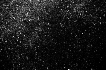 Fototapeta na wymiar Defocused bokeh on a black background of raindrops at night